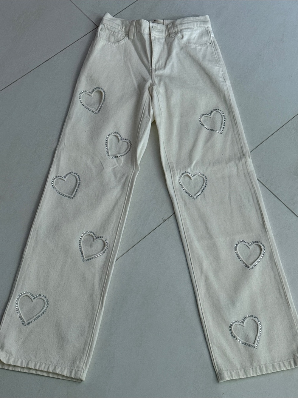 Alice + Olivia White Jeans with crystal heart cutouts. Never worn without tags.